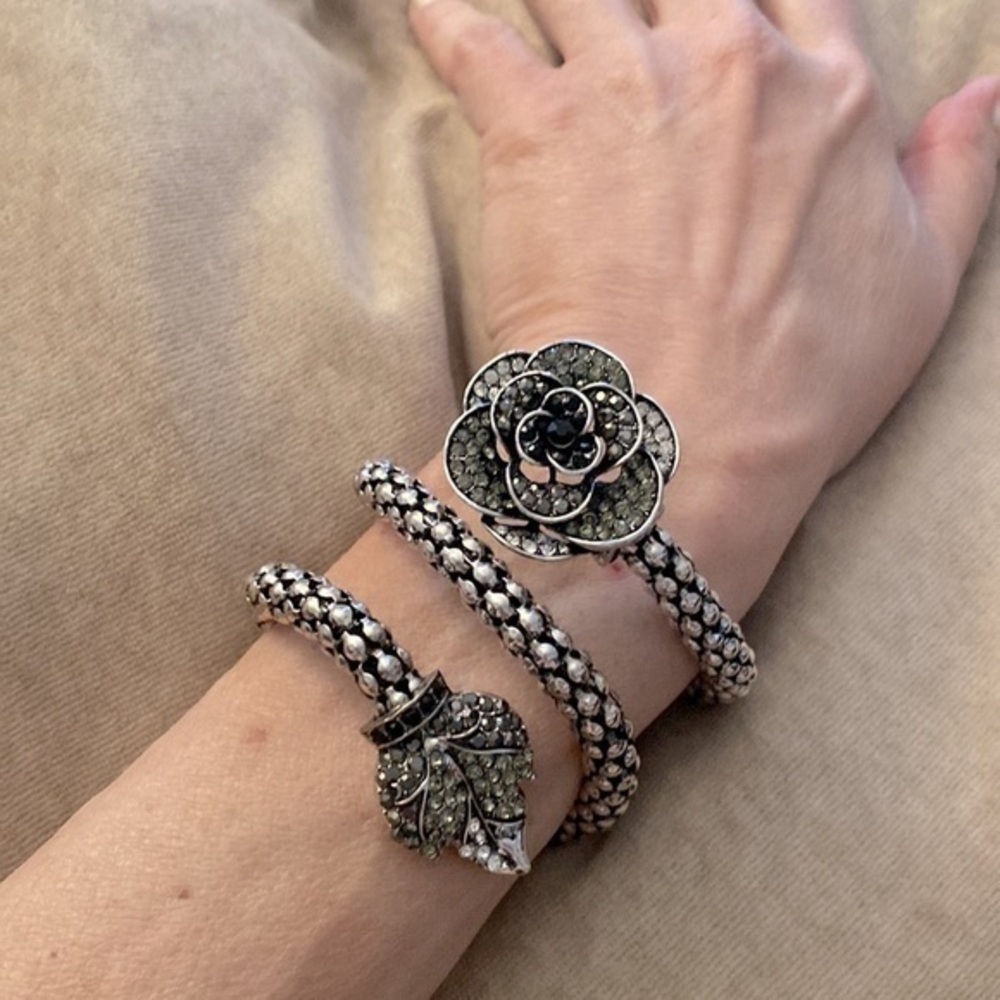 Wrap bracelet in flower design w/ CZ  stones. Gunmetal plated finish. 🌸
